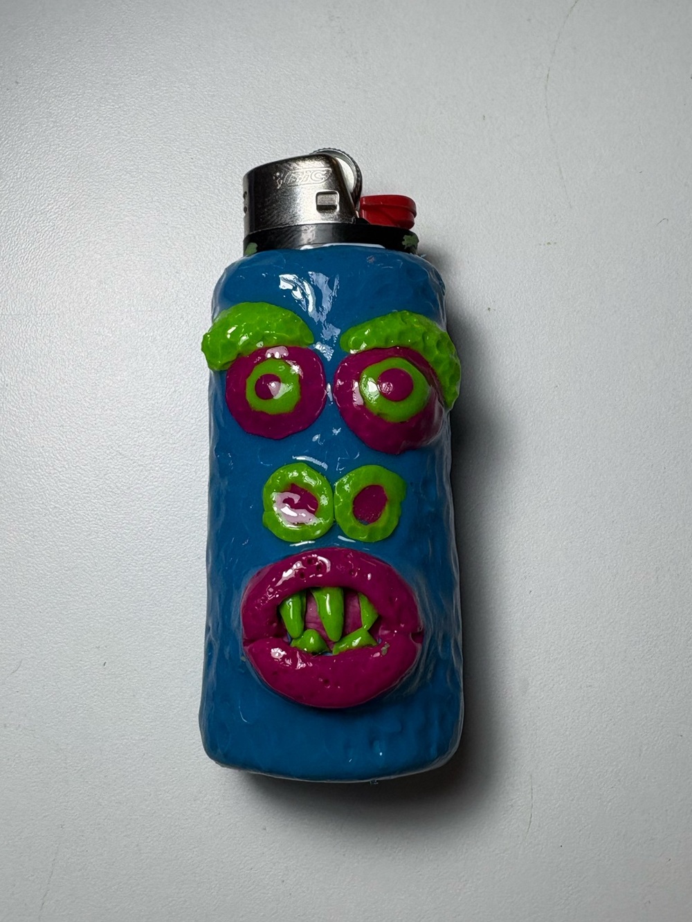 Handcrafted Blue Monster Lighter Cover - Unique Home Art